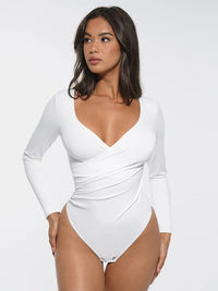 Shaping bodysuit with V-neckline, pleated waist, and tummy control