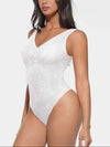 Seamless lace bodysuit with deep V-neckline
